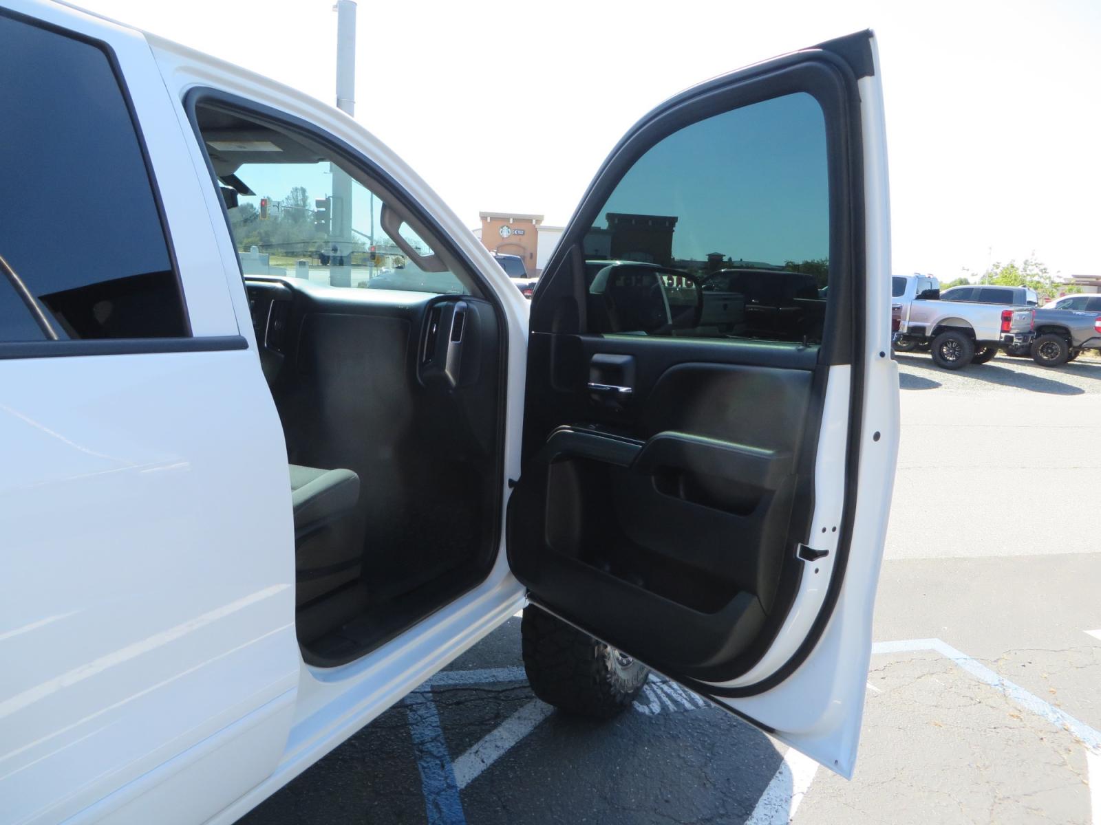 2018 White /BLACK Chevrolet Silverado 1500 LT (3GCPCREC7JG) with an 5.3L V8 OHV 16V engine, automatic transmission, located at 2630 Grass Valley Highway, Auburn, CA, 95603, (530) 508-5100, 38.937893, -121.095482 - Must see Pre Runner.... CST front lift spindals, Camburg UCA's, King Adjustable 2.5 Coil-overs, King 2.5 rear shocks, 35" Toyo RT Trail tires, 17" Method Race wheels, MZ front skid plate, G2 rear differntail cover, Full size bed mounted spare tire, Black Vinyl roof wrap, smoke tail lights and 3rd br - Photo #45